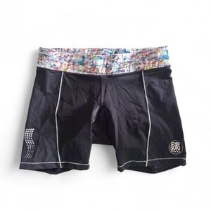 De Soto Black Triathlon Shorts with Colorful Waistband Woman Cycling.